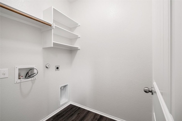 111 Colthorpe Ln, Hutto, TX 78634 - washroom featuring electric dryer hookup, dark wood-style floors, hookup for a washing machine, baseboards, and hookup for a gas dryer