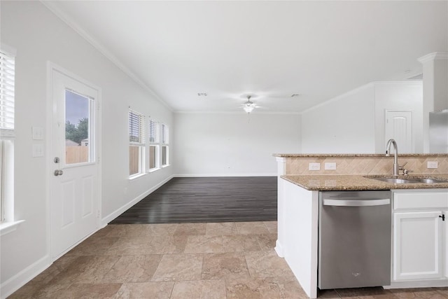 111 Colthorpe Ln, Hutto, TX 78634 - kitchen with dishwasher, a sink, a ceiling fan, ornamental molding, and baseboards