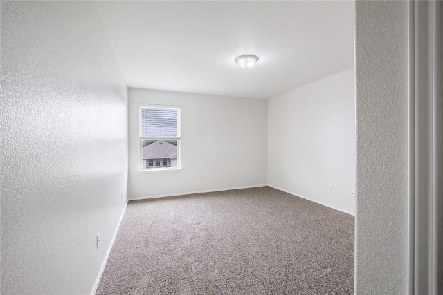 111 Colthorpe Ln, Hutto, TX 78634 - carpeted spare room featuring baseboards