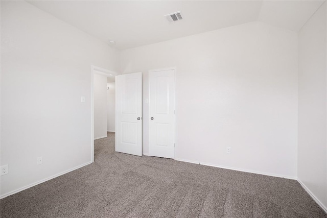 111 Colthorpe Ln, Hutto, TX 78634 - carpeted spare room featuring baseboards and lofted ceiling