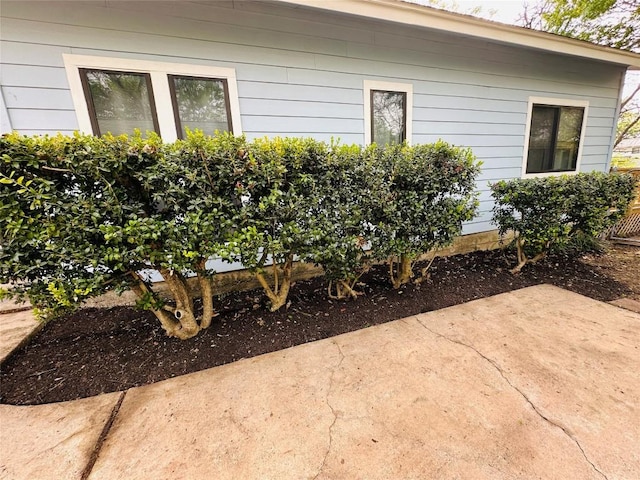 5504 Montview St, Austin, TX 78756 - view of side of home with a patio area