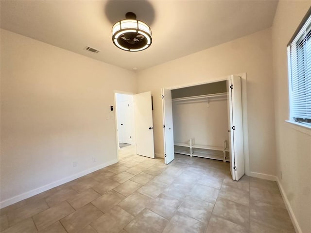 5504 Montview St, Austin, TX 78756 - unfurnished bedroom featuring a closet and baseboards