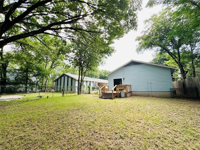 5504 Montview St, Austin, TX 78756 - fenced backyard with a deck