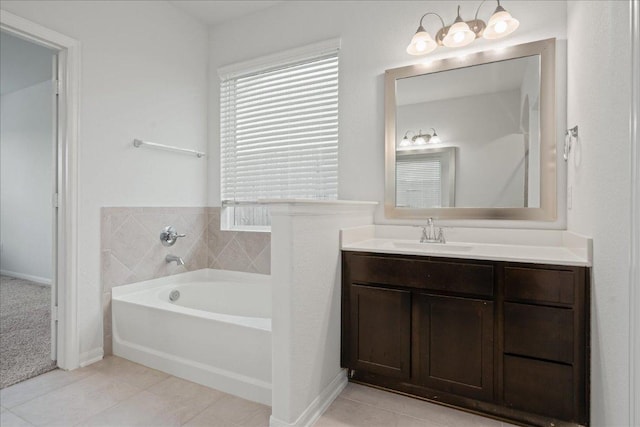 423 Leadtree Loop, Buda, TX 78610 - full bath featuring a bath, vanity, and tile patterned flooring