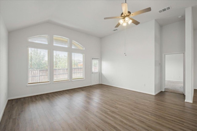 423 Leadtree Loop, Buda, TX 78610 - spare room featuring wood finished floors, a ceiling fan, and high vaulted ceiling
