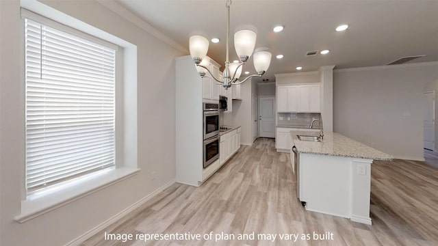 210 Dewey Dr, Killeen, TX 76542 - kitchen featuring ornamental molding, light wood-type flooring, recessed lighting, backsplash, and white cabinets