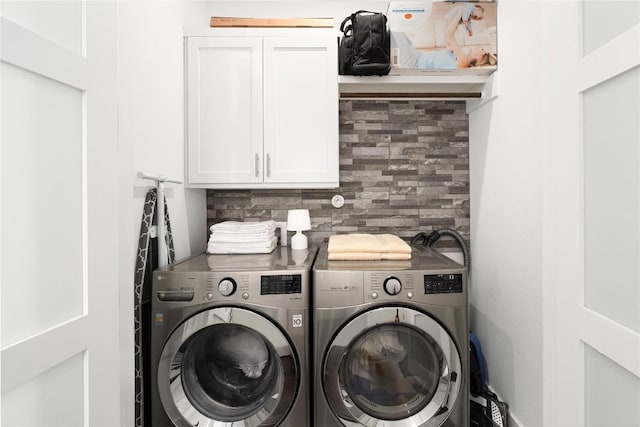 208 Honey Creek Ct Unit 29, Austin, TX 78738 - laundry room featuring independent washer and dryer and cabinet space