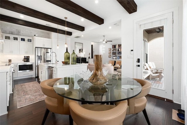 208 Honey Creek Ct Unit 29, Austin, TX 78738 - dining area featuring ceiling fan, dark wood-type flooring, beamed ceiling, and recessed lighting