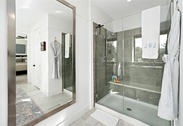 208 Honey Creek Ct Unit 29, Austin, TX 78738 - ensuite bathroom featuring a stall shower and a ceiling fan