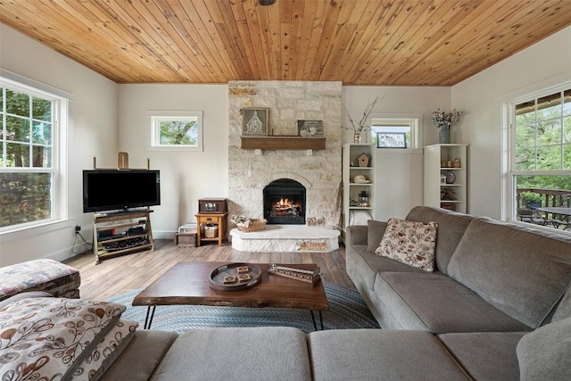 3205 River Place Dr Unit B, Belton, TX 76513 - living room featuring wood finished floors, wooden ceiling, a fireplace, and baseboards