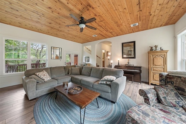 3205 River Place Dr Unit B, Belton, TX 76513 - living area with arched walkways, wood ceiling, a ceiling fan, stairs, and light wood-style floors