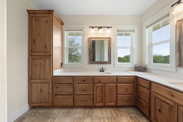 3205 River Place Dr Unit B, Belton, TX 76513 - full bathroom featuring double vanity and baseboards