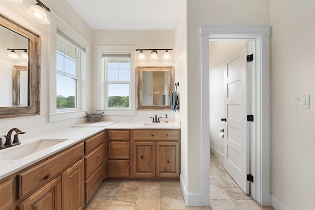 3205 River Place Dr Unit B, Belton, TX 76513 - full bath featuring double vanity and baseboards