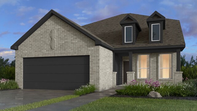 1001 Thunderhead Trl, Georgetown, TX 78628 - view of front of property with a garage, brick siding, and driveway