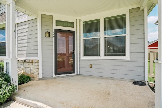 1261 Nevarez, Kyle, TX 78640 - view of exterior entry with covered porch and stone siding