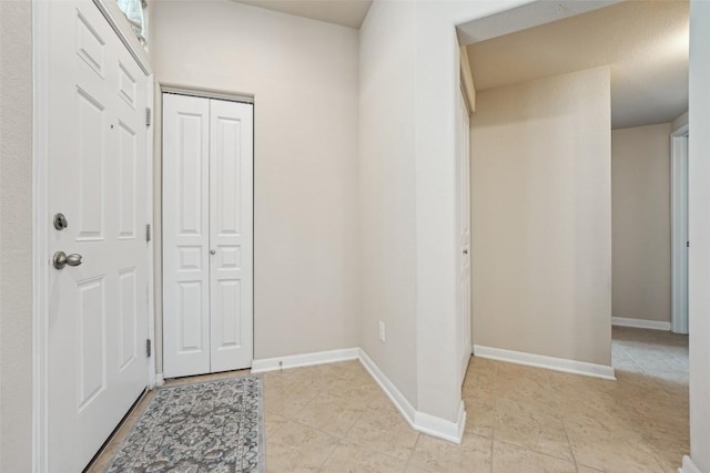1261 Nevarez, Kyle, TX 78640 - foyer entrance with light tile patterned flooring and baseboards