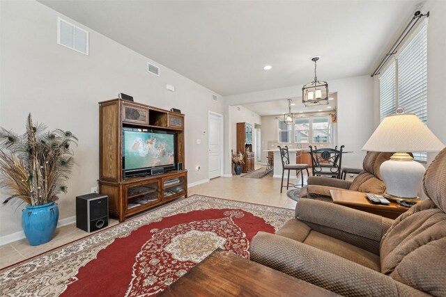 1261 Nevarez, Kyle, TX 78640 - living room featuring baseboards and recessed lighting
