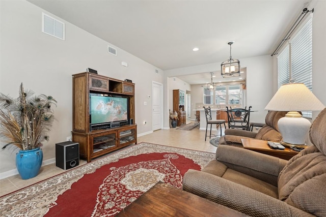 1261 Nevarez, Kyle, TX 78640 - living room featuring baseboards and recessed lighting