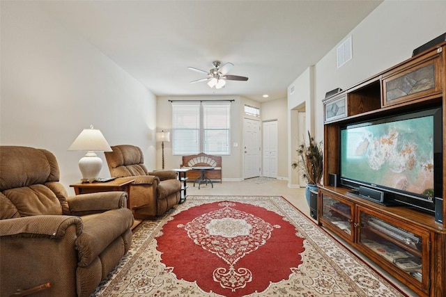 1261 Nevarez, Kyle, TX 78640 - living area featuring ceiling fan and baseboards