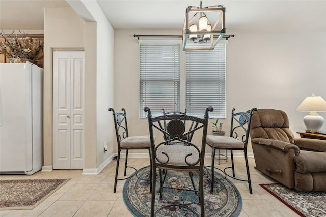 1261 Nevarez, Kyle, TX 78640 - dining space featuring a chandelier and light tile patterned floors