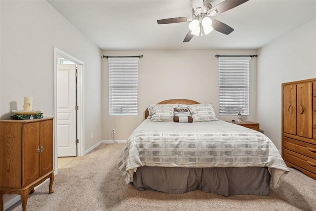 1261 Nevarez, Kyle, TX 78640 - bedroom featuring light colored carpet, ceiling fan, and baseboards