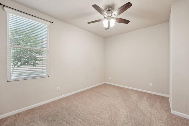 1261 Nevarez, Kyle, TX 78640 - carpeted spare room with baseboards and a ceiling fan