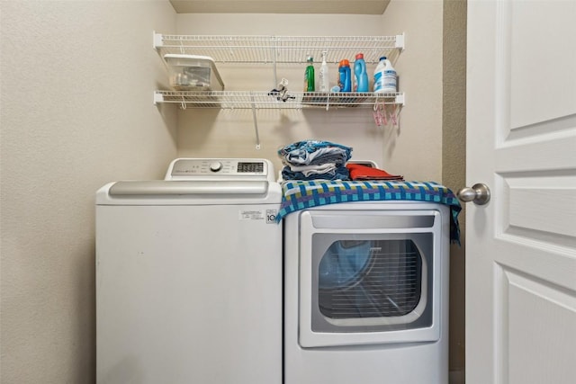 1261 Nevarez, Kyle, TX 78640 - laundry area with washer and dryer