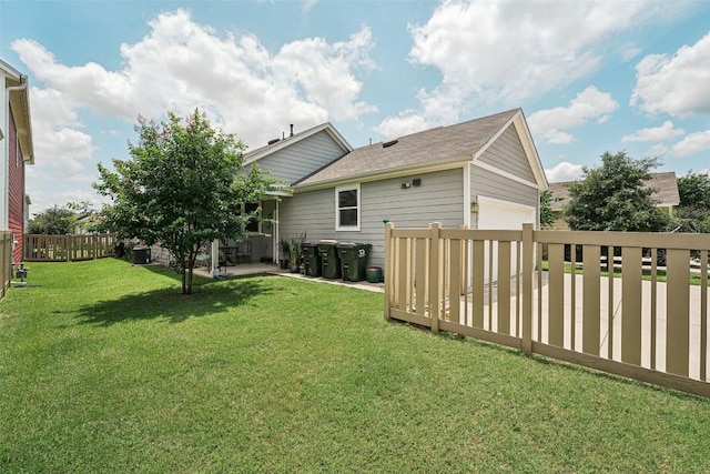1261 Nevarez, Kyle, TX 78640 - view of yard featuring an attached garage