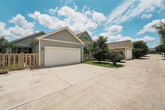 1261 Nevarez, Kyle, TX 78640 - view of front facade with concrete driveway and a garage