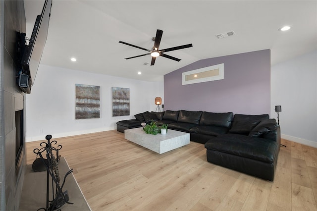 120 Acapulco Dr, Lakeway, TX 78734 - living room featuring vaulted ceiling, wood finished floors, a ceiling fan, baseboards, and recessed lighting