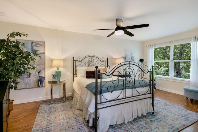 2114 Goodrich Ave Unit 3, Austin, TX 78704 - bedroom with wood finished floors, baseboards, and ceiling fan