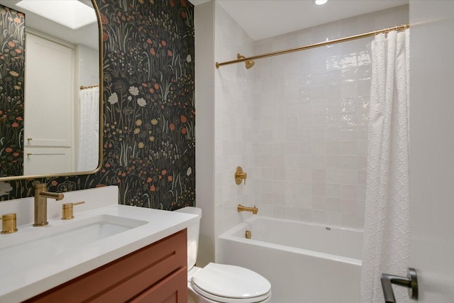 2114 Goodrich Ave Unit 3, Austin, TX 78704 - full bathroom featuring wallpapered walls, shower / tub combo with curtain, vanity, and toilet