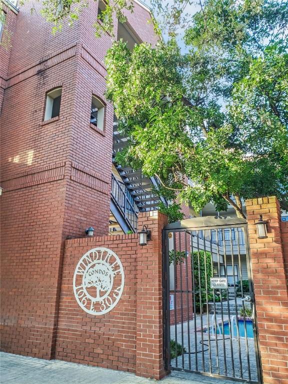 106 E 30th St Unit 305, Austin, TX 78705 - gate with a community pool