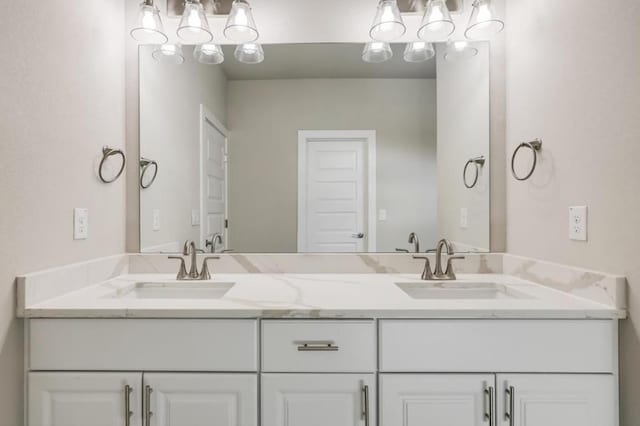 21710 Patton Dr, Lago Vista, TX 78645 - bathroom featuring double vanity