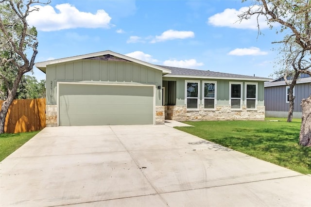 21710 Patton Dr, Lago Vista, TX 78645 - ranch-style house with stone siding, board and batten siding, and a garage