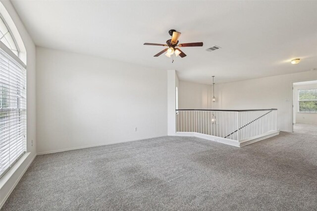 14009 Rountree Ranch Ln, Austin, TX 78717 - empty room with carpet, a ceiling fan, and baseboards