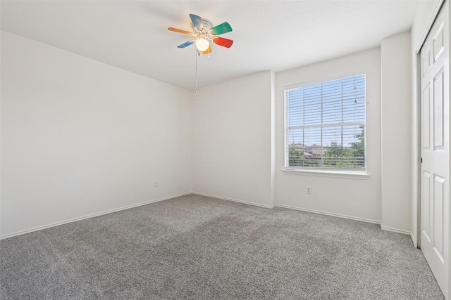 14009 Rountree Ranch Ln, Austin, TX 78717 - empty room with carpet flooring, ceiling fan, and baseboards