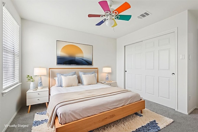 14009 Rountree Ranch Ln, Austin, TX 78717 - carpeted bedroom with a closet, baseboards, and a ceiling fan