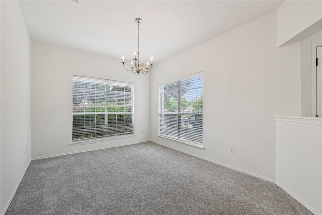 14009 Rountree Ranch Ln, Austin, TX 78717 - spare room with a chandelier, carpet, and baseboards