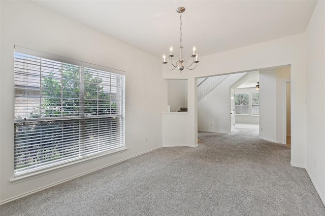 14009 Rountree Ranch Ln, Austin, TX 78717 - carpeted empty room featuring a chandelier, healthy amount of natural light, and baseboards