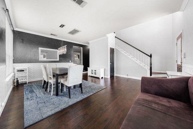 1600 Serenity Springs Cv, Cedar Park, TX 78613 - dining room featuring a chandelier, hardwood / wood-style flooring, stairs, ornamental molding, and wainscoting
