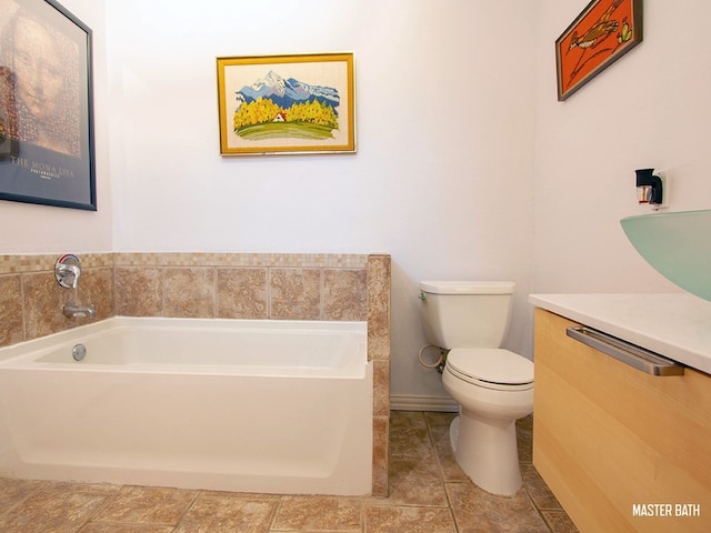 1808 Maple Ave, Austin, TX 78702 - bathroom featuring a garden tub, toilet, and vanity