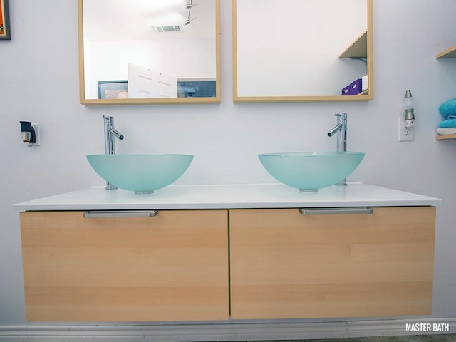 1808 Maple Ave, Austin, TX 78702 - bathroom featuring double vanity