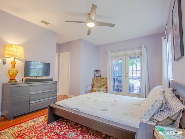 1808 Maple Ave, Austin, TX 78702 - bedroom featuring french doors, light wood-style flooring, and a ceiling fan