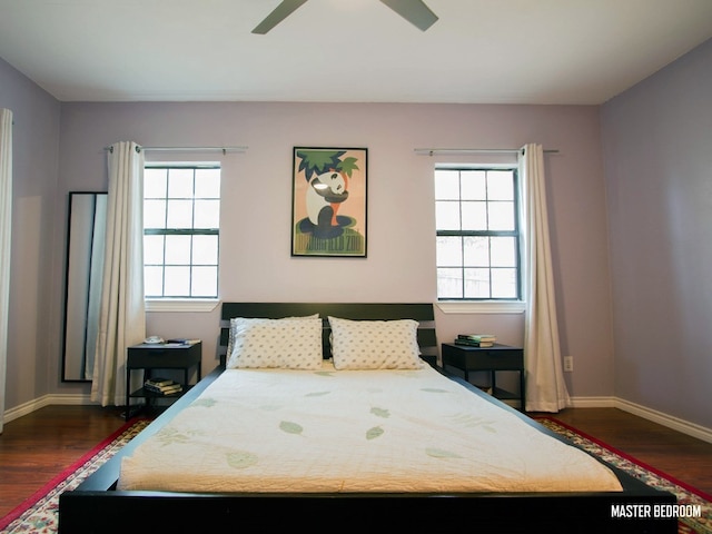 1808 Maple Ave, Austin, TX 78702 - bedroom featuring dark wood-style floors, baseboards, and a ceiling fan
