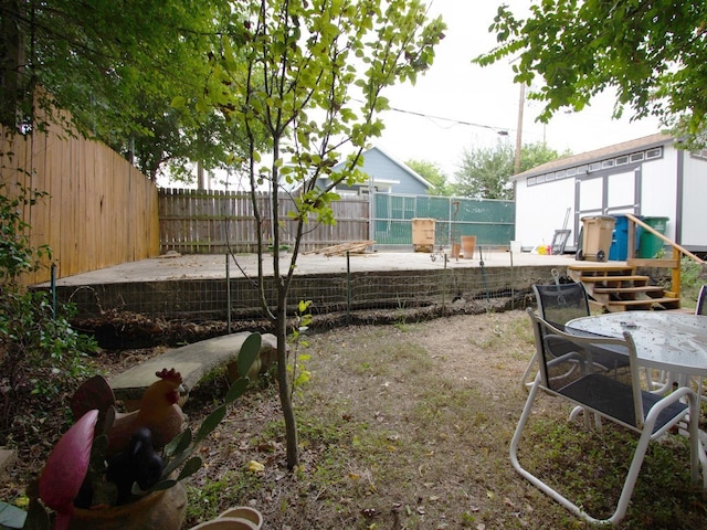 1808 Maple Ave, Austin, TX 78702 - fenced backyard featuring a deck and outdoor dining area