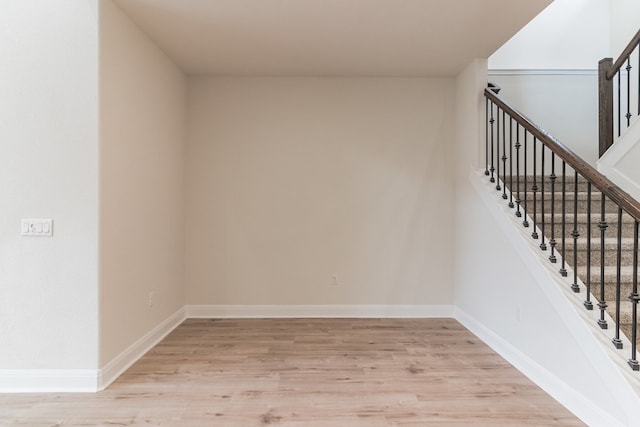 17900 Trieste Dr, Pflugerville, TX 78660 - stairway featuring wood finished floors and baseboards