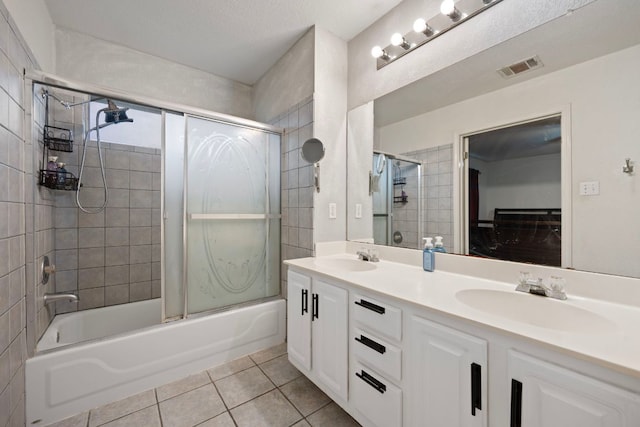 1207 Rolling Ridge Dr, Round Rock, TX 78665 - bathroom featuring tile patterned floors, shower / bath combination, and double vanity