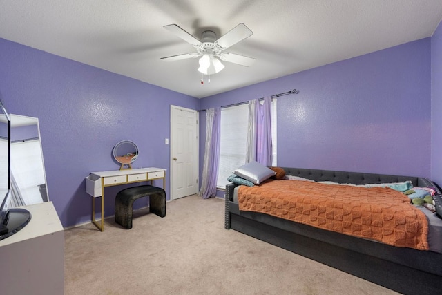 1207 Rolling Ridge Dr, Round Rock, TX 78665 - bedroom with carpet, a textured wall, and a ceiling fan