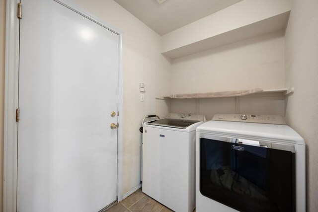 1207 Rolling Ridge Dr, Round Rock, TX 78665 - laundry room featuring washer and clothes dryer